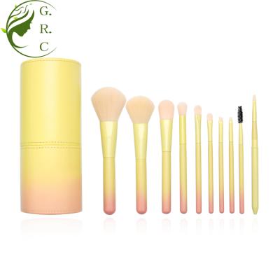 China Angular Blush 10pcs Custom Wood Handle Wooden Nylon Hair Gradient Pink Yellow Makeup Brush Set With Cylinder Case Te koop