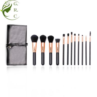 China Angular Blush 12pcs Makeup Brush Set Black Wooden Handle Rose Gold Makeup Brush Set Cosmetic Bag zu verkaufen