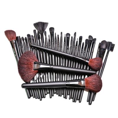 中国 Angular Blush Custom Logo Luxury New Goat Hair Black Cosmetic Brush Top Quality Wooden Handle Make Up Brush 32pcs Makeup Set Brush 販売のため