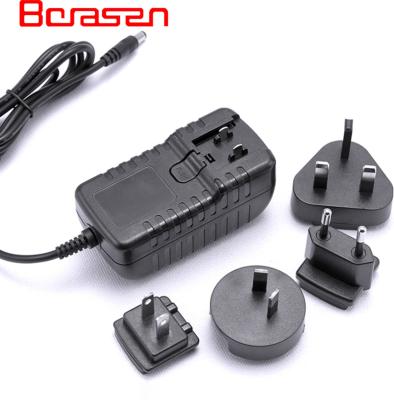 China Computing Devices UK US AU EU Plugs All In One Interchangeable AC 24W 12v 2a DC Power Adapter With 5.5*2.5*10mm DC Plug for sale