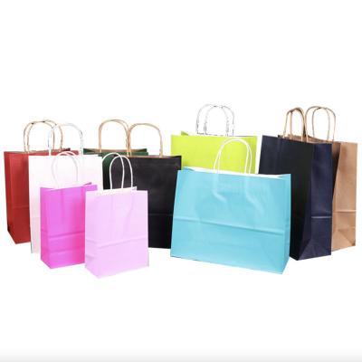 China Recycled Materials Customized Color And Logo Kraft Paper Bag With Handle Food Gift Flower Paper Bag for sale