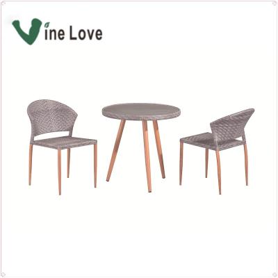 China Thin Flat Resistance Rattan Cafe Table And Chair Outdoor Furniture for sale