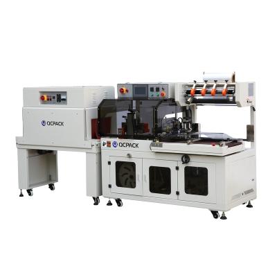 China Fully-Closed Horizontal CLOTHING Sealer Film Double Side Heat Shrink Packing Machine For Boxes Cartons for sale