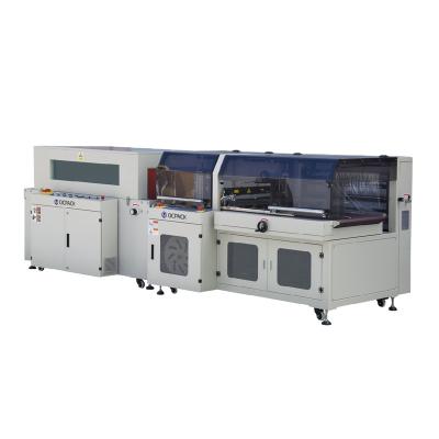 China Fully Automatic CLOTHING Heat Shrink Wrapping Film Side Sealing Machine For Door for sale