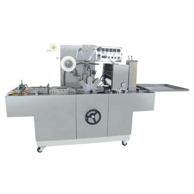 China Small CLOTHING Packaging Machine , dvd case cellophane wrapping machine for sale