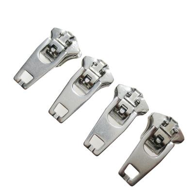 China Nickel Free Factory Customized Logo In Puller YG Puller Zipper Slider Stainless Steel Sliders Spring Lock Pullers For Jeans for sale