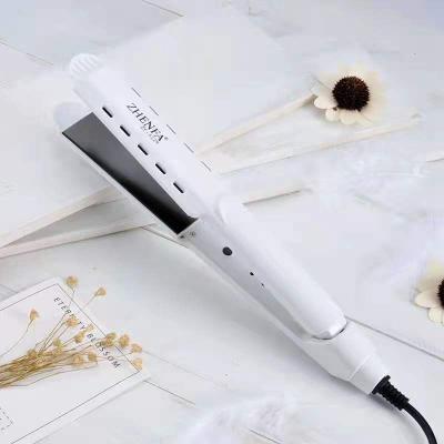 China Newest Adjustable Heat Adjustable Settings Hair Curler Hair Beauty Radio Wireless Rechargeable Automatic Curling Iron for sale