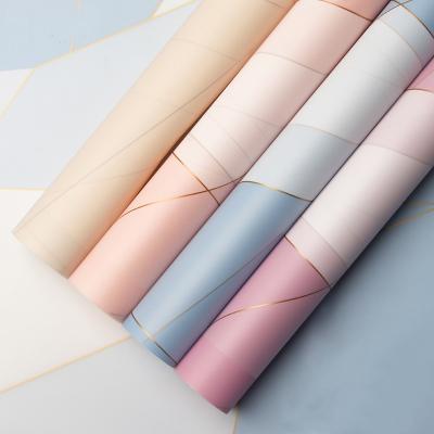 China Hot Selling Line Pengfa 2021 Gift Wrapping Paper Magnetic Force Supply Waterproof Flower Wrapping Paper Plastic Waterproof Florist for sale