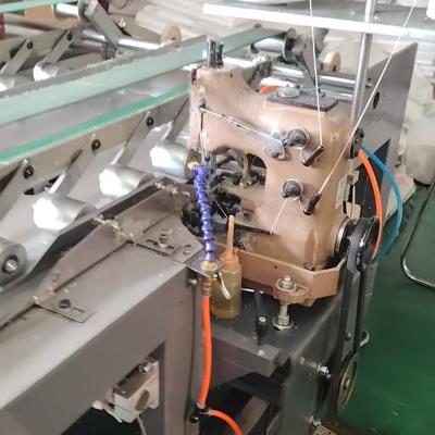 China Automatic Plastic Woven Bags Hot And Cold Integrated Sewing Machine for sale