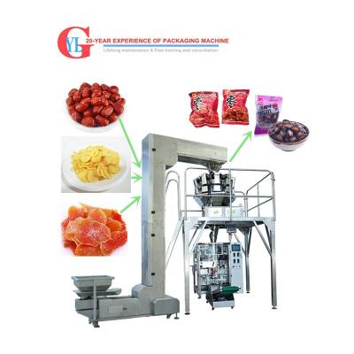 China Full Automatic Multifunctional Potato Chips Dried Fruits Nuts Blocks Material Center Sealed Pillow Bag/4/3 Side Seal Food Snacks Packing Machine for sale