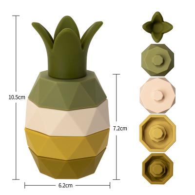 China 100% Eco-Friendly High Quality Pineapple Shape Bpa Free Silicone Stacking Building Blocks Set Funny Baby Teether Toy Fruit Teether for sale