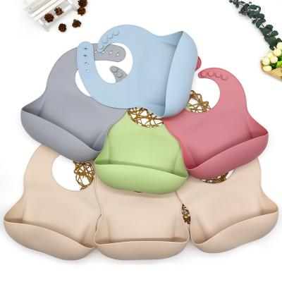 China 6 Years Factory Manufacturer Adjustable Fit Waterproof Silicon Bib Food Grade Silicone Unisex Soft Baby Bibs for sale