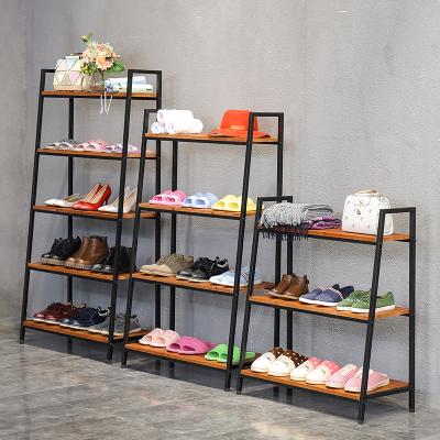 China Eco - Friendly Bespoke Home Used Metal Black Wooden Shoes Shelves Commercial Corner Display Stand Furniture DIY Shoes Rack for sale