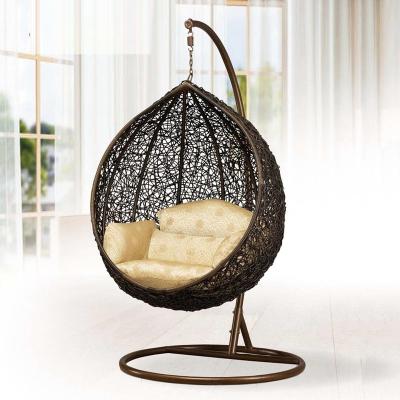 China Eco-friendly Outdoor Rattan Single Seat Wicker Swing Egg Swing Hanging Chair With Metal Stand for sale