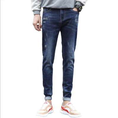 China Fashionable men's breathable jeans fall elastic thin new young men's growth trousers pants for sale