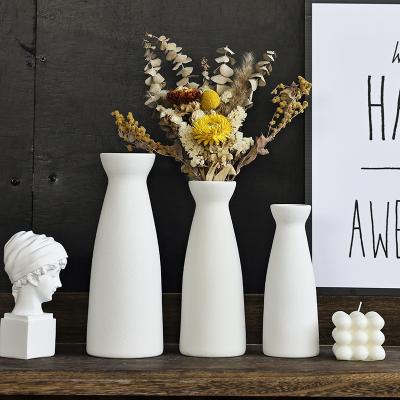 China Modern Simple Nordic Handmade Clay Ceramic Flower Vases Dining Table Wedding Home Living Room Decoration Ceramic Vase for sale