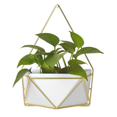 China Art Eco-friendly Ceramic Flower Pot Geometric Hanging Planter Pot for Indoor Wall Planter Decor for sale