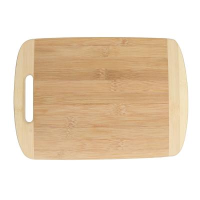 China Viable two color bamboo chopper with defoamer cutting board for hanging for sale