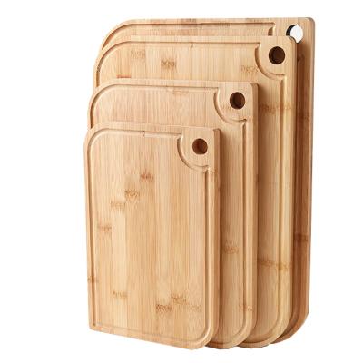 China Sustainable Bamboo Cutting Board For Home Use Thickened Rolling Board Fruit Cutting Board Can Be Hung for sale