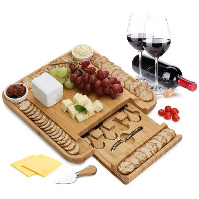 China Sustainable Natural Bamboo Steak Tableware Eco-friendly Western Tableware Creative Ceramic Cheese Cutting Board Knife Set With Drawer for sale