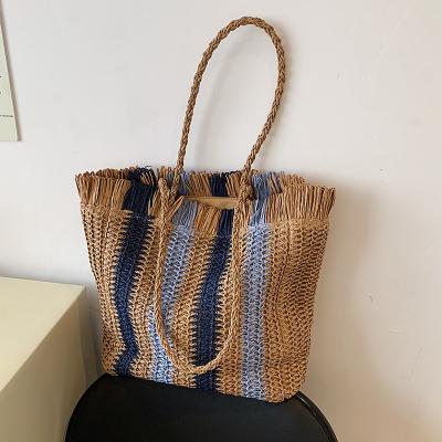 China Street Trends 2022 Large Capacity Casual Shoulder New Woven Stripes Fashion Simple Beach Tote Straw Bag for sale