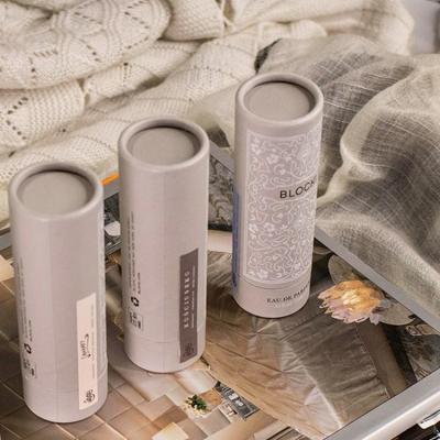 China Recycled Materials Custom Design Plastic Kraft Paper Cylinder Bottles Package Paper Tube For Perfume Bottle for sale