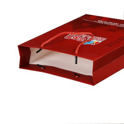 China Eco Friendly Manufacturers Sell Customizable Red Paper Packaging Bags Logo For Packaging Products for sale