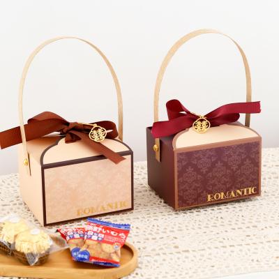 China Custom Recycled Materials Gift Paper Box With Handle Packaging Candy Snacks Chocolate Wedding Birthday Party Present Bag for sale