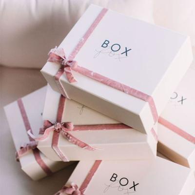 China Recycled Materials Custom Size And Design Surprise Two-Pieces Lid And Base Bow Tie Cardboard Birthday Gift Box Paper Packaging Box for sale