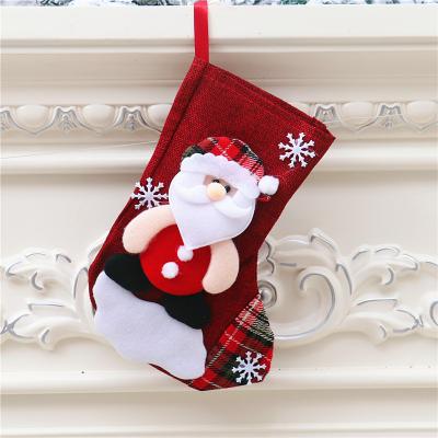 China Cotton and Linen + 2022 New Year Nonwoven Christmas Stockings Jars Candy Gift Bag Merry Christmas Tree Decorations for Christmas Home Ornament for sale