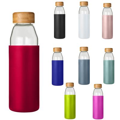 China Sustainable Borosilicate Bamboo Sports Lid 500ml Glass Drinking Water Bottle With Silicone Sleeve OEM for sale