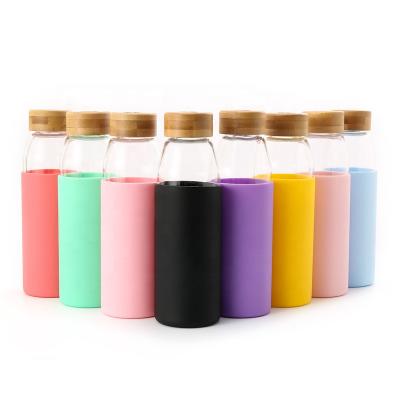 China High Sustainable Borosilicate Glass Custom Drinking Water Bottle With Silicone Sleeve Eco - Friendly for sale