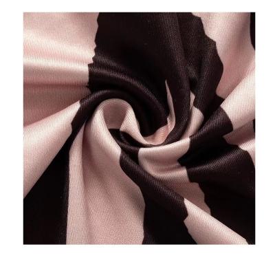 China New Trend Light Tear-Resistant Milk Pink 4 Way Stretch Fabric Silk Printed Fabric for sale