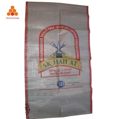 China Custom logo printing colorful moisture proof bopp coated large plastic circular pp corn grain rice woven bags for sale