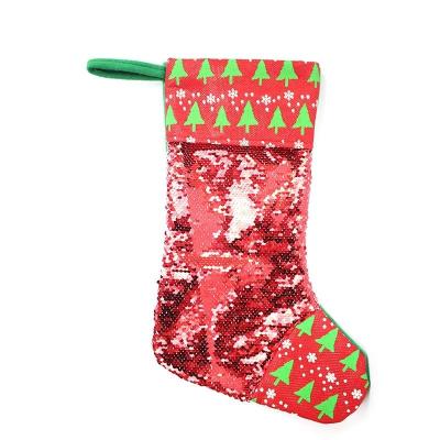 China Christmas Magic Stockings Best Selling New Christmas Glitter Two Color Magic Decorations Kids Candy Stocking Pendant Christmas Gift Red Socks for sale