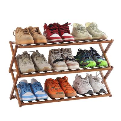 China Expandable Hot Selling Multi-Tier Shoe Organizer Shelf Freely Standing Bamboo Folding Shoe Rack for sale