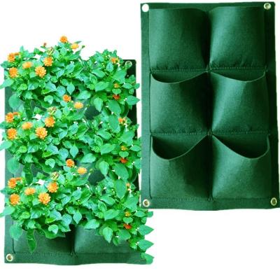 China Eco-Friendly Plant Grow Stronger And Thicker 9 Pocket Planter Wall Hanging Flowerpot Bag Vertical Felt Garden Plant Bags for sale