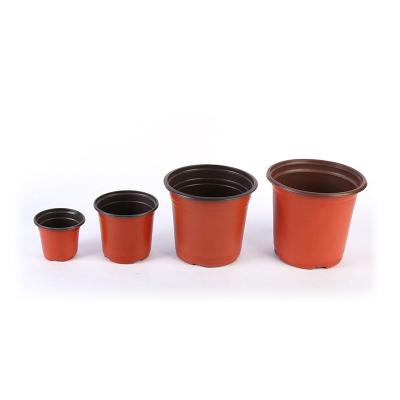 China Eco - Friendly Black Round Nursery Pots And Plastic Planter Garden Flower Pot for sale