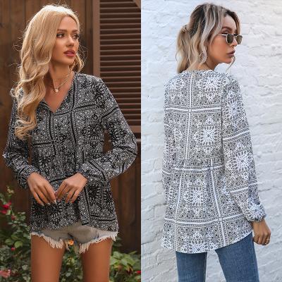 China Autumn European And American Printing explosive v-neck ladies anti-pilling fringed long-sleeved blouses and chiffon women's shirts for sale