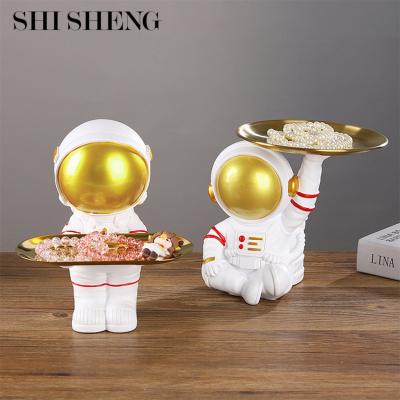 China Creative Eco-friendly SHI SHNEG Resin Astronaut Model Jewelry Storage Gold Tray For Jewelry Storage Main Decoration for sale