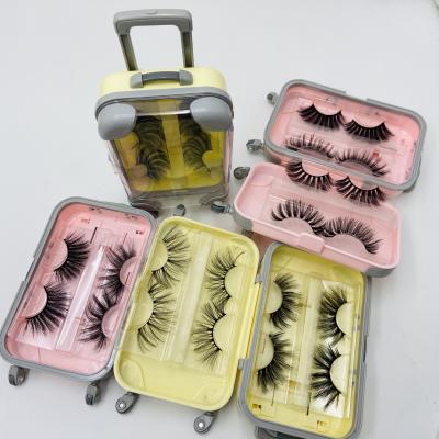 China Free Wholesale Natural Shipping 2 Pairs/Case In Soft Case 25mm Length Mink Strip Lashes Unique Packaging for sale