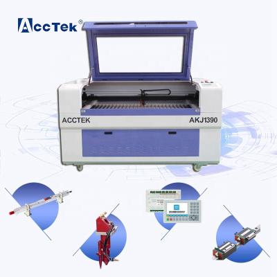 China Laser Engraving CNC Laser Engraving Machine 100w CNC CO2 Laser Cutter 1390 For Wood Acrylic for sale