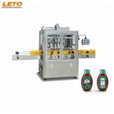 China Automatic Oil Sauce Paste CLOTHING Honey Applicator Machine Liquid Filling Line for sale