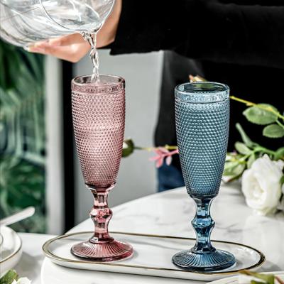 China Retro Champagne Glass Goblet machine made different color embossed champagne glass cup for wedding for home for hotel restaurant for sale