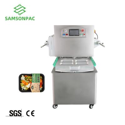 China Fresh Food Press Meal Tray Sealing Machine Vacuum Skin Packing Machine Vacuum Packed Ready Cooked Food Vacuum Skin Packing Machine for sale