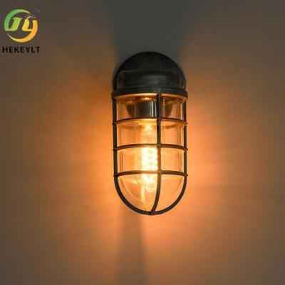 China Retro Industrial Wall Lamp Art Dining Room Living Room Clothing Shop Hollow Glass Iron Wall Lamp Bedside Lamp for sale