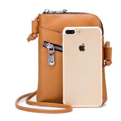 China GENUINE LEATHER Briefcase Mini Travel Outing Small Storage Bag Portable Large Capacity Cell Phone Bag for sale