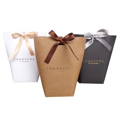 China Handmade Custom Printed Your Own Logo Cardboard Packaging White Brown Kraft Paper Gift Craft Shopping Paper Bag With Handles for sale