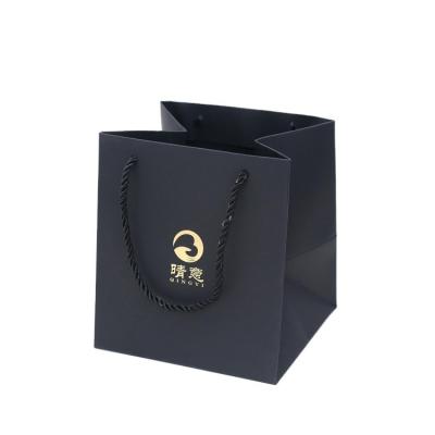 China Custom Printed Paper Bag Luxury Handmade Logo Jewelry Packaging Kraft Shopping Gift Paper Bag Black With Ribbon Handles for sale