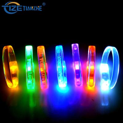 China Promotional Gifts Hot New Products LED Flash Light Up Wristband Movement Music Bracelet Sound Flashing Party Gifts for sale